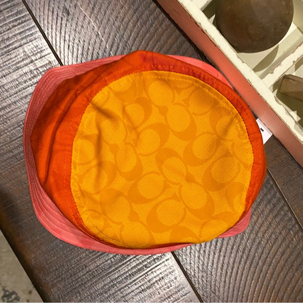 Coach  signature blocked bucket hat.